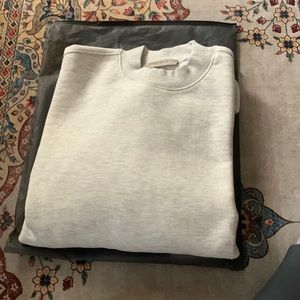 Brand new Essentials relaxed crewneck sweater.Light oatmeal color size S